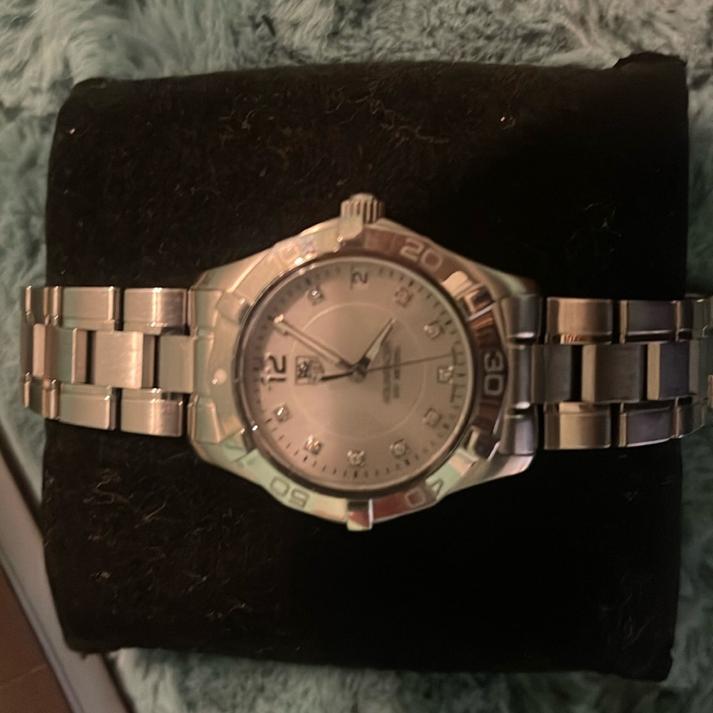 Authentic TagHeuer ladies watch-silver
WORN for ONE WEEK ONLY!!!!